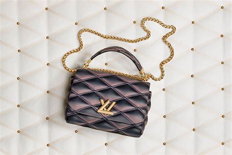 louis vuitton bag with gold plate|louis vuitton go 14 mm.